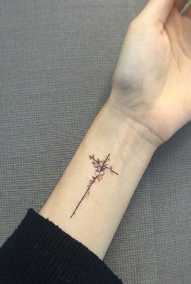 cross flower tattoo