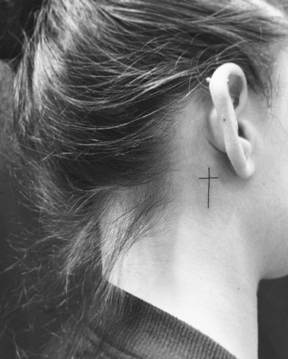 cross tattoo ear