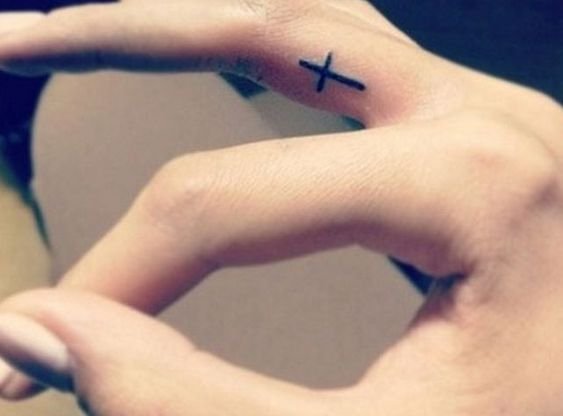 finger cross tattoo