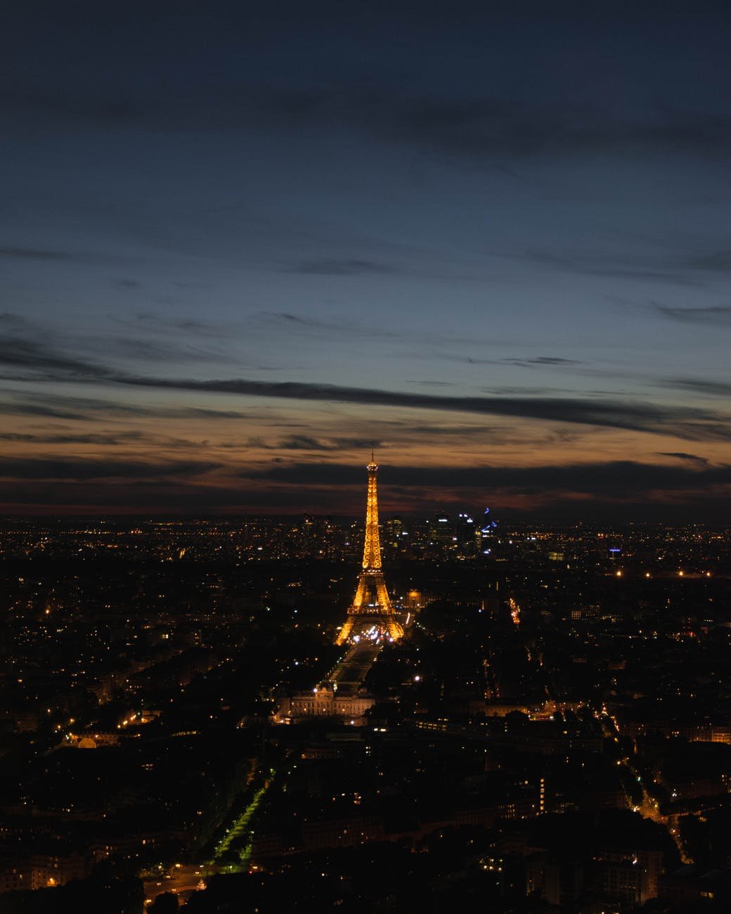 photo of paris cityscape with the eiffel tower during night time
